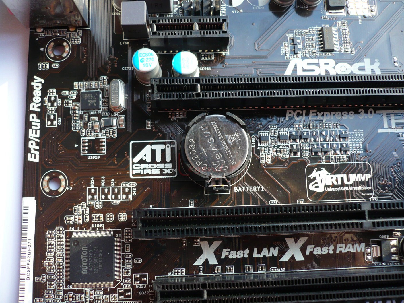 060-asrock-h77-pro4-foto-batteria-tampone